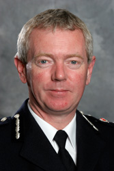 Tony Lake Chief Constable Lincolnshire Police 24 Sept 2003 to 6 June 2008
Tony Lake joined Lincolnshire as Chief Constable in September 2003 

Tony Lake joined the Metropolitan Police in 1972 and spent much of his early service working in Central London.  Most of his career has been engaged in operational roles and he was posted to both Tottenham and Acton Police Stations as an Inspector, policing inner city deprived areas.  He also worked at New Scotland Yard on two occasions and was involved in planning major public order policing operations in the early 1980’s.

In 1985 he won a Bramshill Scholarship and went to Corpus Christi College, Cambridge where he read History obtaining BA (Hons). 

In 1992 he transferred to West Yorkshire Police where he worked as Divisional Commander in South Bradford, introducing community policing to an area of considerable diversity.  He was also heavily involved in supporting “Bradford City Challenge” which had significant successes in tackling rising crime and was regarded as a beacon example of crime reduction and partnership working.  

In 1994 Tony Lake attended the Strategic Command Course at Bramshill and in October 1994 became Assistant Chief Constable (Operations) in Sussex.  Between 1996 and 2000 he held numerous portfolios in Sussex and was involved in planning the police response to the live animal export protest on the South Coast and other environmental protests throughout the force area.

In 1998 he was invited to South Africa by the United Nations Development Programme and the South African Government to offer advice on combating car crime and introducing community policing.

In April 2000 he took up the post of Deputy Chief Constable, British Transport Police and continued to contribute to the work of the ACPO Crime Prevention Sub-Committee.  He was Chairman of the ACPO Property Tracking Group and represented ACPO (UK) in work which is developing a European Standard in vehicle tracking.
Keywords: Tony Lake CC