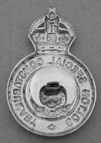 Special Constabulary KC Cap Badge solid center  Reverse (1)
Special Constabulary KC Cap Badge solid center, Reverse. Button hole fixing. Submitted by: Garry Farmer
