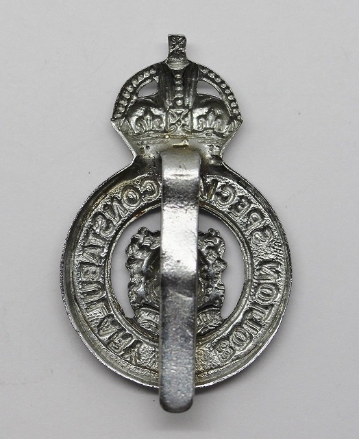 Special Constabulary KC Cap Badge fretted center (Reverse)
Special Constabulary KC Cap Badge fretted center (Reverse). Slider fixing. Submitted by: Garry Farmer
