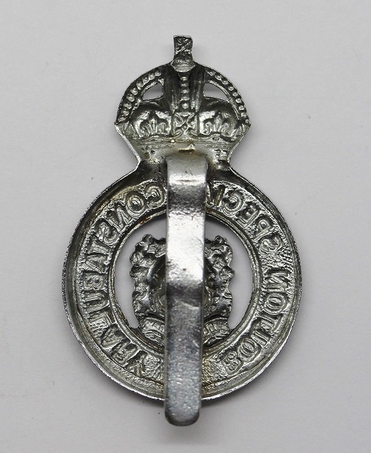 Special Constabulary KC Cap Badge fretted center (Reverse)
Special Constabulary KC Cap Badge fretted center (Reverse). Slider fixing. Submitted by: Garry Farmer
