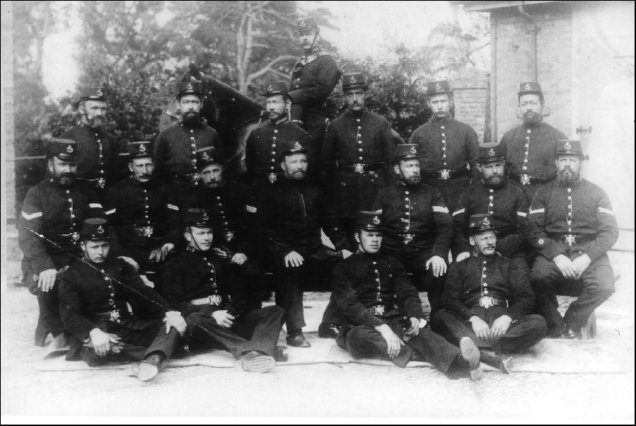 Sevenoaks Division - Kent Constabulary
Sevenoaks Police circa 1898. Note the Corporal’s stripes on the sleeves. This rank was removed around 1910, together with the three grades of PC.
Submitted by John Endicott
(Curator Kent Police Museum)

Keywords: Sevenoaks kent Group