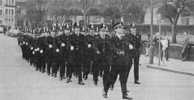Annual Parade 1975; Leeds
First Assistant Chief Constable Colin Sampson leads of the Area contingents for the march through Leeds city centre to the Civic Hall saluting dias

Photograph submitted by: Alan Pickles
Keywords: Yorkshire Leeds Sampson