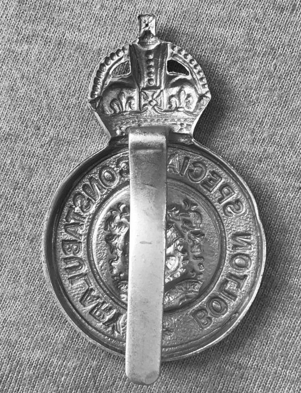 Special Constabulary KC Cap Badge solid center Reverse (2)
Special Constabulary KC Cap Badge solid center, Reverse. Slider fixing. Submitted by: Garry Farmer
