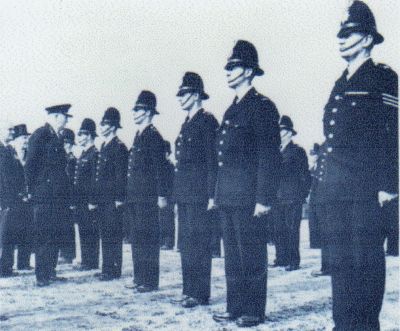 HMI Inspection Late 1950's
HMI Inspection of Bradford City Police officers. Late 1950's in Peel Park. HMI Sir Charles Martin.
Photograph submitted by: Alan Pickles
Keywords: Bradford HMI