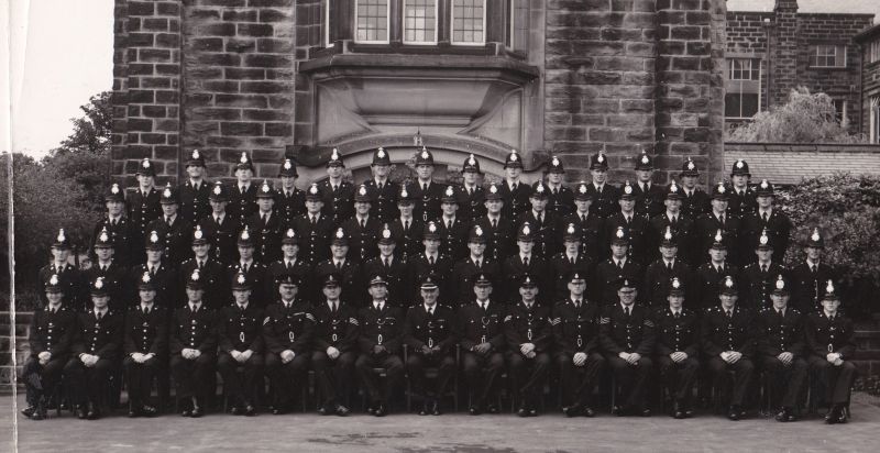 August / September 1961
I am 7th from Right in the second row (David France). In front of me is our Class Tutor, Sgt Williams (West Riding), to his left Sgt Hunter (later Dep Commissioner, Met Police now retired and living in Ilkley), Over my right shoulder on the 3rd row is Pc Mick Sparrow, Sheffield City, and to his left Pc Sharrocks, Rotherham Boro, to his left Pc Rhodes, Sheffield City. On Pc Sparrow's right is Pc Neil and 10th from left is Pc Tony Motley Sheffield City. Back row, extreme left is Pc Mawson, 
Submitted by David France
