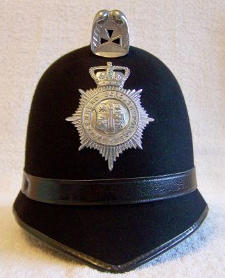 Birkenhead Borough Helmet, 1960's
Birkenhead Borough Helmet, 1960's, one piece design, chromed cowl vent and helmet plate, black leather centre band
Keywords: birkenhead helmet Headwear