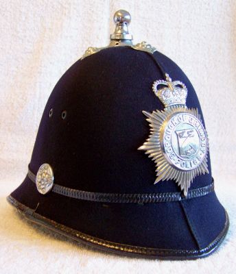 Grimsby Borough Helmet, 1960's
Grimsby Borough Helmet, 1960's, two panel design with black metal centre band, chrome balltop and cross base, ear rosettes and helmet plate
Keywords: grimsby helmet Headwear