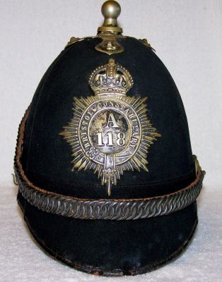 Bristol Constabulary Chained Helmet, circa 1920's
Bristol Constabulary Chained Helmet, circa 1920's, six panel design with blackened balltop, helmet plate, ear rosettes and chinchain
Keywords: Bristol Headwear