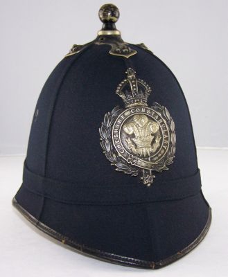 Cheshire Constabulary helmet
Cheshire Constabulary helmet, six panel with cloth centre band, blackened ball top and helmet plate with Guelphic pattern crown, stamped inside with Officers number '345' and '14' believed to be for the year 1914.


Keywords: cheshire helmet