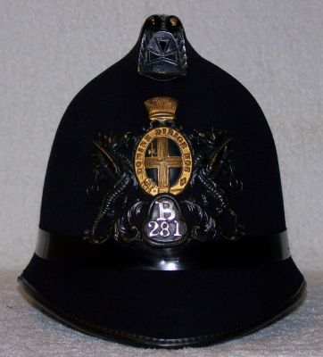 City of London Constables Helmet, 1970 - 1980
City of London Constables Helmet, 1970 - 1980. Cork helmet, gold detailing painted on, staybrite numerals
Keywords: city london helmet Headwear