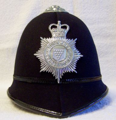 Cornwall Constabulary Helmet, 1960's
Cornwall Constabulary Helmet, 1960's, cork two panel construction, chrome rose and helmet plate
Keywords: cornwall helmet headwear