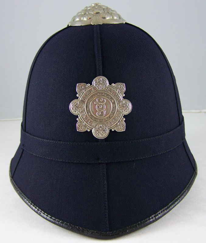 Garda Siochana Helmet
Garda smooth cloth, six panel helmet; late type with small helmet plate.
Keywords: Grada helmet