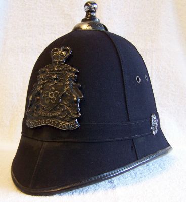 Leicester City Night Helmet; 1960's
Leicester City Night Helmet; 1960's, cork helmet with smooth six panel cloth covering, cloth centre band with blackened side roses, balltop and coat of arms helmet plate
Keywords: leicester helmet headwear