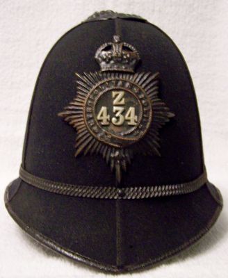 Metropolitan Constables & Sgts Helmet, 1912 - 1935
Metropolitan Constables and Sgt's helmet, 1912 - 1935. Note the Officers collar number was also worn on the helmet plate 
Keywords: metropolitan helmet Headwear
