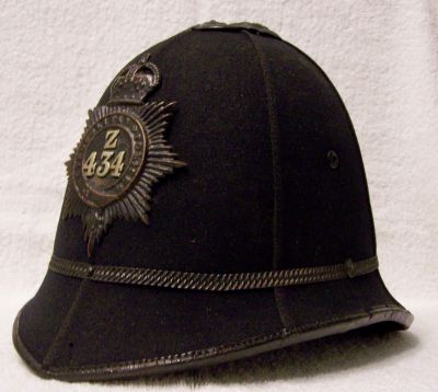 Metropolitan Constables & Sgts Helmet, 1912 - 1935
Metropolitan Constables and Sgt's helmet, 1912 - 1935. Note the Officers collar number was also worn on the helmet plate 
Keywords: metropolitan helmet Headwear