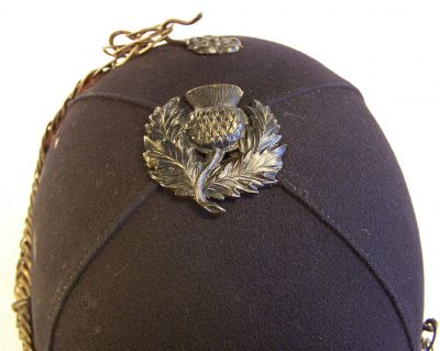 Midlothian Constabulary Victorian Chained Helmet
Midlothian Constabulary Victorian Chained Helmet, detail of thistle top and rear hook
Keywords: midlothian chained helmet