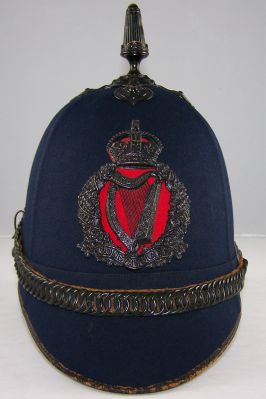 Royal Irish Constabulary helmet, 1917
Royal Irish Constabulary helmet, blue cloth with black fittings of pattern unique to the RIC, helmet stamped inside '60186' which is the number of James Forbes, appointed in 1901 and the date '17' for the date of issue 1917
Keywords: Irish helmet