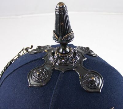 Royal Irish Constabulary Helmet, 1917
Detail of top mount of RIC helmet showing fluted spike and unique pattern cross base
Keywords: Irish helmet