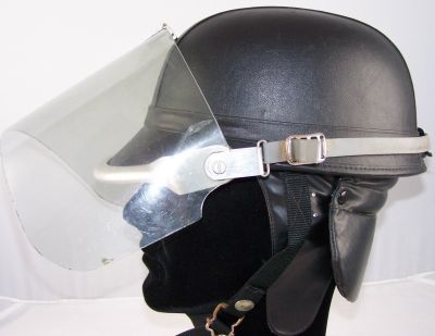 RUC Skulgarde Riot Helmet
RUC Skulgarde riot helmet, shown wth detachable visor, 1969 - 1972
Keywords: RUC, helmet