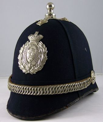 Rotherham Borough Police Helmet
Rotherham Borough Police Helmet, late Victorian, blue four panel cork construction, white metal helmet plate, ball top and chinchain
Keywords: Rotherham, helmet