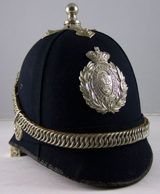 Rotherham Borough Police Helmet
Rotherham Borough Police Helmet, late Victorian, blue four panel cork construction, white metal helmet plate, ball top and chinchain
Keywords: Rotherham, helmet