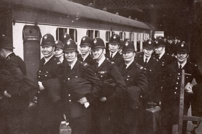 Salford City Officers wearing Mutual Aid Helmets
Salford City detachment of Officers boarding a train on route to the Queens Coronation, London. Wearing Mutual Aid helmets instead of the usual Salford City helmet in order to blend in with the Metropolitan Police
PC116 Harry Hardisty, 4th from left.
Keywords: salford helmet mutual aid Group
