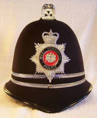 West Yorkshire Police, Inspectors Helmet 1980's
West Yorkshire Police, Inspectors Helmet 1980's, reinforced design with two thin chrome bands to denote rank, 'West Yorkshire Police' spelt in gold lettering
Keywords: west yorkshire helmet headwear