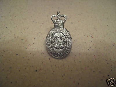 Collar Badge
