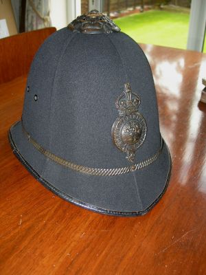 Edwardian Worcestershire Police helmet
6 panel with bronzed finish to metal fittings, owners name inside.
Keywords: Worcestershire Helmet Headwear