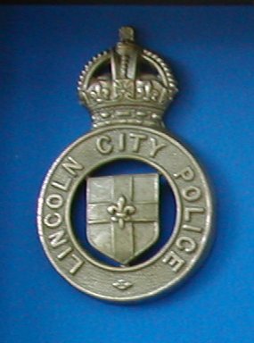 LINCOLN CITY POLICE CAP BADGE
