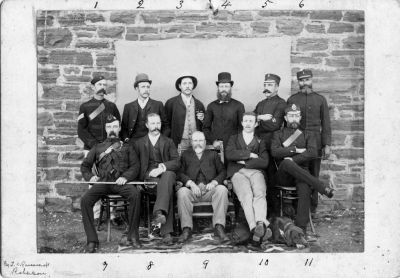 Robertson, South Africa
Photographer T. Ravenscroft of Robertson.
The Police Station was constructed in 1887, and I believe this photo may date from about this time.
There are no names but the people are described as follows;
1-Sergeant of Police: 2-Sheriff: 3-District Surgeon: 4-Chaplin: 5-Goaler: 6-Native Court Messenger: 7-Inspector of Police: 8-Asst. Resident Magistrate: 9-Resident Magistrate: 10-Junior Clerk: 11-Chief Constable.
