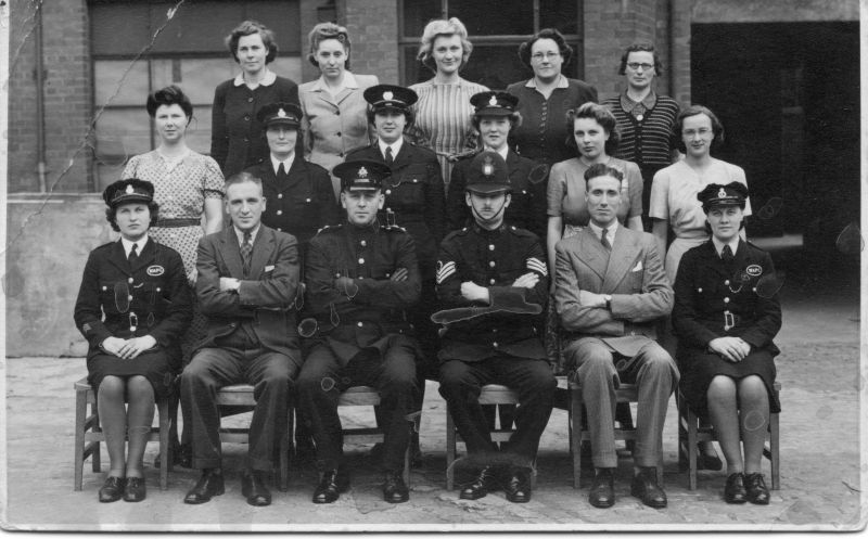BIRMINGHAM CITY POLICE, DIGBETH 1944
The photo is handwritten on the back 'Digbeth Police Station, 1944'.
I would think this was a course for female officers of the WAPC.
The Sgt is PS 36.
The female officer front right has a Luton Borough Police, Special Constabulary cap badge.
The female officer front left has 3 service stripes on her right sleeve.
