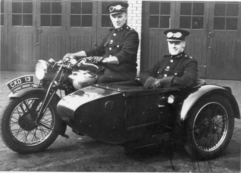 Liverpool City Police (Circa 1941)
Cst's 96H & 148H names shown on the back are Bill DICKSON & Jim CARNOCHAN

Photos has date of 11/01/1941 written on the front, but on the back it is stamped from 'Liverpool & Bootle Constabulary Identification Section' and dated as reprinted in 1972.

The Royal Enfield motor cycle combination CKD 13  photograph was taken at Old Swan police Yard where at that time, 1941, the motor patrols were based.   The sidecar was known as a Winnipeg model.
