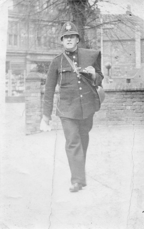 CHESHIRE CONSTABULARY PC 763
Photo WW2 era.  Carrying his cape and gas mask & steel helmet.
