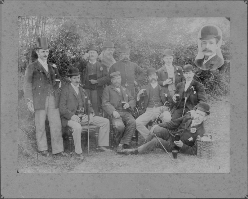 CORNWALL CONSTABULARY DATED 1896
Picture is dated June 1896 and signed by William RICHARDS, and marked as 'Bodmin'.
The Constable has a number on his left breast which appears to be three digits and may be; 14?
Wonderful moustache
The face behind the Constable and the one to the right are part of this picture and were added at some stage prior to printing this.
