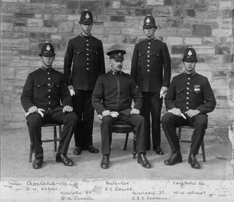 CORNWALL CONSTABULARY GROUP, 1926
Photo believed taken at Bodmin
Standing: PC 62 G.A.Clarke; PC23 C.J.J.Carrivick
Seated: PC 133 G.W.Kersey; Insp. F.T.Basher; PC 66 W.W.Wright
