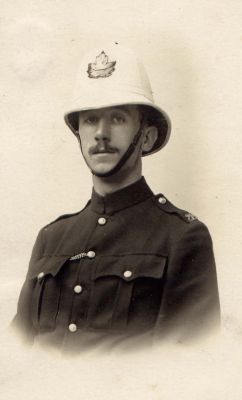 CANADIAN POLICE OFFICER
No idea what force this is, as the 'Maple leaf' helmet plate was pretty generic in the 20's.
