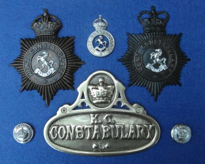 KENT CONSTABULARY BADGES
A Victorian police house plate plus KC & QC helmet plates.
