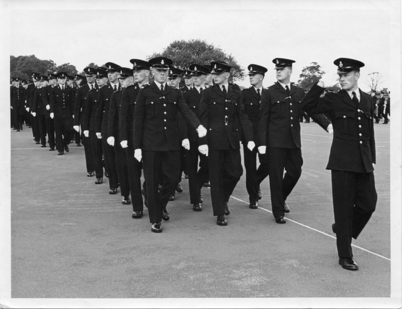 LANCASHIRE CONSTABULARY - GRADUATION PARADE
This photo was included with the two of PC Brown's funeral.
It appears to be a graduation parade.
The 'right marker' and the officer two to his left are both Lancashire Constabulary officers.
It may be that one of these is in fact PC Brown.

No information on the photo, but all were contained in an envelope addressed to 'Mrs Brown'.
