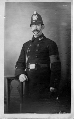 LEEDS CITY POLICE, PC 19 (Poss. TINGEY John George)
I believe this to be John George TINGEY.
If so, he also served as a Met. Police Special Cst. from 17/08/1914 - 04/09/1916.
The armband he is wearing is khaki with a red crown.  It is stamped as 'Issued under the authority of the Army Council', and has the serial number of 9226. I have this item.
What is its significance?
