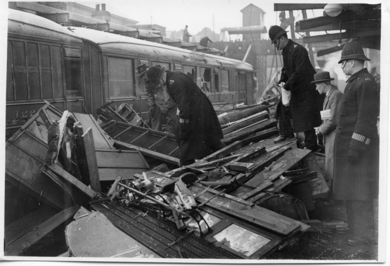 L.N.E.R. POLICE AT GIDEA PARK 1947
Photo shows members of the LNER Police at the scene of a fatal train crash at Gidea Park Station, Essex on 02/January/1947.
Visible are PC L123; PC 152; PC 307.
