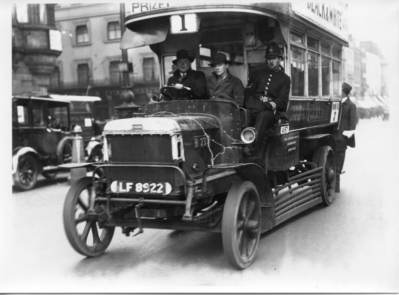 METROPOLITAN POLICE 'D' DIVISION, GENERAL STRIKE 1926
The photo has typed on the back: General Strike 1926.  Policeman riding with volunteer drivers.  Barb wire on bonnet is to stop strikers damaging the engine.
It has a file number DH. 8931 C.
It is from the Penfold photographic Archives, and under this is a photo stamp for an address at 27 Sloane Street, London, W.C.2.
