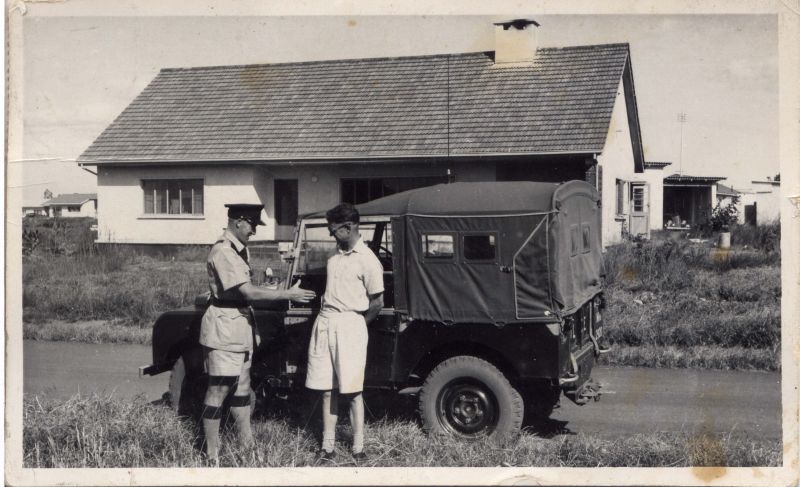 NORTHERN RHODESIA POLICE
Photo circa 1954
The police officer is named Les and the house behind is described as a typical police house.
