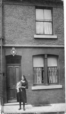 WEST RIDING CONSTABULARY, POLICE HOUSE
This photo shows what I believe is a Police House located at 40 Wellington Street, Mexborough (near Doncaster).
I believe the girl in the photo to be Amelia BARTHORPE of 44 Wellington Street.
This card is one of four that show various members of this family and I believe them to date from 1914/15.
According to google the address still exists and is identifiable as the same house.
