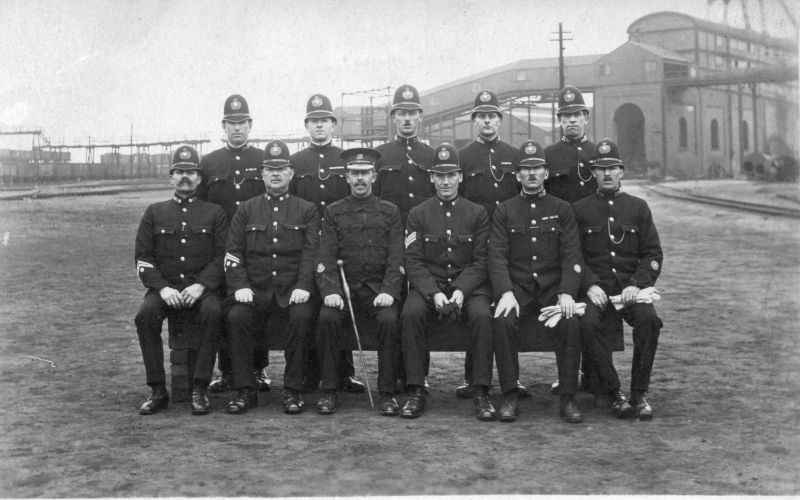 WEST RIDING CONCTABULARY, POSSIBLE TRAINING GROUP, SEE NOTES
This is mixed group of West and East Riding officers.
If you look closely only three people in the front(sitting) rank are actually wearing West Riding insignia.  All the others are wearing East Riding collar insignia despite wearing West Riding helmets.
The exception is the seated officer with a peak cap who has east Riding insignia.
The location is unknown, but the card is dated to 1925 by the manufacture stamp box.
There must be a good story here somewhere!!
