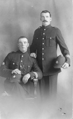 WINNIPEG CITY POLICE, PC 40 EWAN CAMPBELL (LEFT)
PC Ewan CAMPBELL is seated on the left.
Note the 'duty arm band' worn on the left sleeve.
Nice image of the helmet plate.
These two men came from Glasgow together, but not sure if they were police officers in Scotland.
