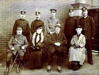 Durham County Constabulary Chief Constable group
Photograph taken at Felling Divisional Office in 1917 on the award of the Military Cross to Lt John Gibson Gargate (back row in army uniform, he was PC1002, retired as a C/Supt) Back row Insp ?. Insp ?. Gargate MC, Insp ?, Supt Albert Gargate (JG Gargate's father).  Front row, Not known, CC's wife, Chief Constable William Morant, Nanny Gargate. (Wife of Albert and mother of John Gibson Gargate)
Keywords: Durham County Constabulary