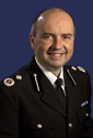 Dave Whatton Acting Chief Constable Greater Manchester Police
Dave Whatton took up the role of Deputy Chief Constable in April 2006 and was appointed Acting Chief Constable in March 2008.

He joined GMP from the West Midlands Police on promotion to Assistant Chief Constable in December 2002. In April 2003, he became ACC with responsibility for Criminal Investigation Division, Special Branch, and Scientific Services.

Dave joined West Midlands Police in 1983. In 1996 he graduated with a Master of Science Degree in Public Sector Management and in 2002 was awarded a Postgraduate Diploma in Criminology.

As a uniformed officer and detective he worked in Birmingham, Sandwell and Wolverhampton before a secondment to the Regional Crime Squad and National Crime Squad.

In 1998 he was promoted to superintendent and worked as operations superintendent in Willenhall and then as chief superintendent as divisional commander in Sutton Coldfield.

Dave is a director of ACPO and a member of ACPO Cabinet, ACPO (TAM) Aviation and Transport and CPOSA Panel of Friends.
Keywords: Acting Chief Constable Greater Manchester Police