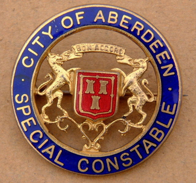 Special Constable Lapel Badge
Gilt metal & Enamel on half moon lapel fixing
Keywords: Aberdeen City Special Lapel Badge