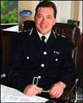 Matt Baggott Chief Constable PSNI
Matt Baggott was appointed Chief Constable is September 2009.

Mr Baggott spent the first twenty years of his service in the Metropolitan Police, operationally focusing on the inner city policing and leading policy reviews on issues such as partnership, regeneration and inner city crime. For 18 months he was Staff Officer to the then Commissioner, Sir Paul Condon, and headed the Metropolitan Police team assisting the Stephen Lawrence Public Inquiry.

In June 1998 he became Assistant Chief Constable in the West Midlands Police with specific responsibility for policing diversity, crime and disorder, professional standards and criminal justice. He assisted the Social Exclusion Unit in developing neighbourhood renewal, and oversaw for ACPO national approaches to hate crime and local strategic partnerships. In November 2001 he was promoted to Deputy Chief Constable, and assisted the Home Office on the Priority Policing Area initiative.

Matt Baggott joined the Leicestershire Constabulary on promotion to Chief Constable in December 2002.

He was awarded a CBE in the 2008 New Years Honours and the Queen's Police Medal in June 2004. Elected a Fellow of University College London in 2006 he was awarded an Honorary Doctorate of Letters by De Montfort University Leicester, in July 2007. He is President of the Christian Police Association, and Vice President of the National Association of Police Chaplains. Until recently he was also a Trustee of Crime Concern for many years.

He was Vice President of the Association of Chief Police Officers 2004-07 and leads the national roll out of neighbourhood policing with a full-time team based in London. A member of the National Policing Board he advises Government on a range of issues from partnership through to social cohesion. He is also working with Sir Ronnie Flanagan on the National Review of Policing.
